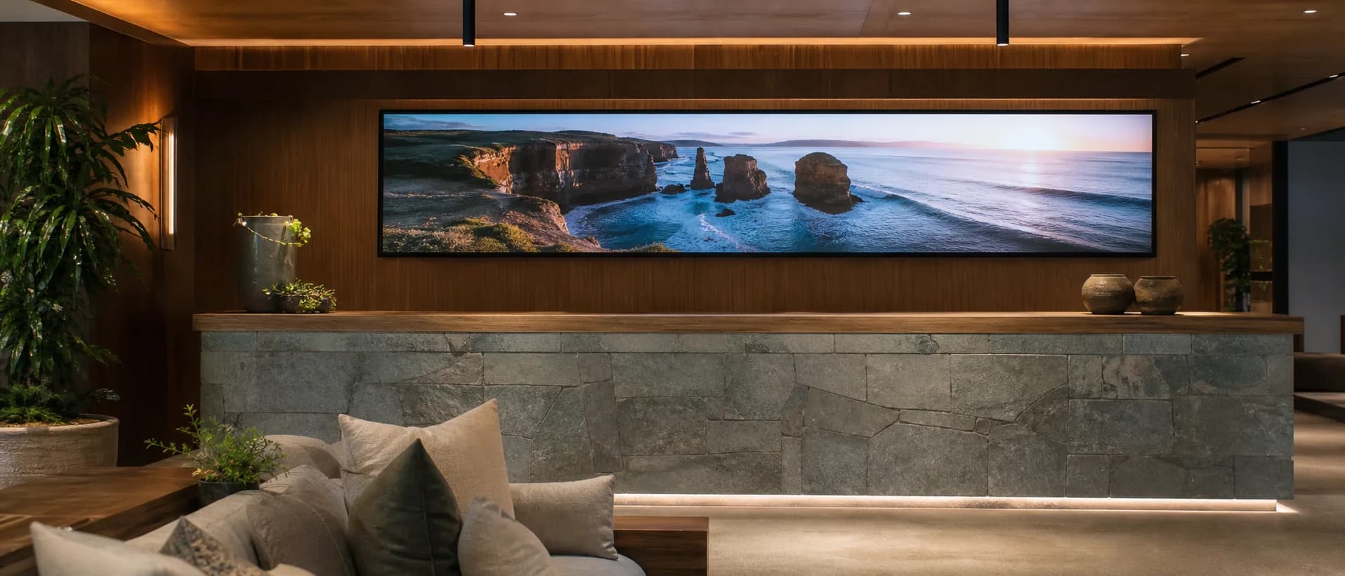 Ultrawide commercial display running in a hospitality reception area